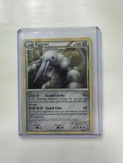 Aggron Holo 1/102 HS Triumphant LP Pokemon Card - Image 1