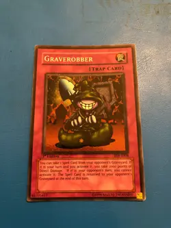 YUGIOH Super Rare Graverobber PSV-E008 1st Edition - Image 1