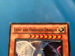 YUGIOH Super Rare Light And Darkness Dragon STOR-ENSE1 PLAYED - Image 3