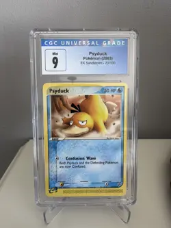 CGC 9 Mint Psyduck 73/100 EX Sandstorm Non Holo 2003 E Reader Pokemon Card - Image 1