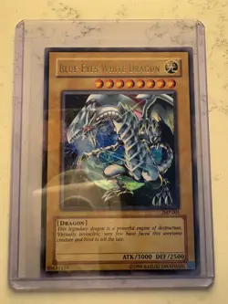Blue-Eyes White Dragon Yu-Gi-Oh JMP-001 Unlimited Holographic Lightly Played - Image 1