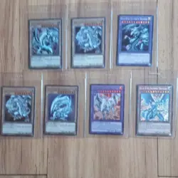 Konami Yu-Gi-Oh! Blue-Eyes White/Ultimate/Shining 7-Card Lot LOB 1st Ed Foil ENG - Image 1