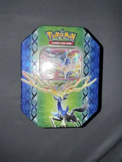 New Sealed Pokemon TCG 2014 Xerneas EX Legend of Kalos Tin With 4 Booster Packs - Image 1