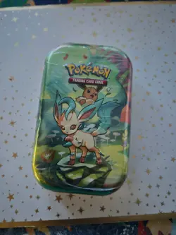 Pokemon TCG: Scarlet & Violet—Prismatic Evolutions Mini Tin – Leafeon - Image 1