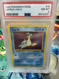 1999 POKEMON FOSSIL #10 LAPRAS-HOLO PSA 8 - Image 1