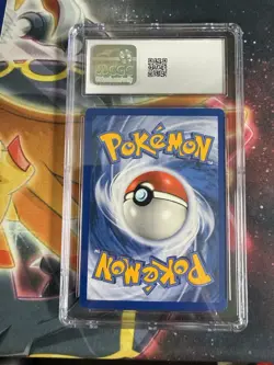 Team Rocket's Meowth Black Star Promo 18 Holo Pokemon League CGC 9 - Image 2