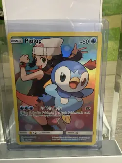 Pokemon Piplup 239/236 Sm-Cosmic Eclipse Holo NM + Card 2019 - Image 1