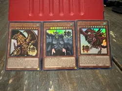 YUGIOH EGYPTIAN GOD SET SLIFER/OBELISK/RA STAMP ULTRA RARE RA05-EN128/129/130 - Image 1