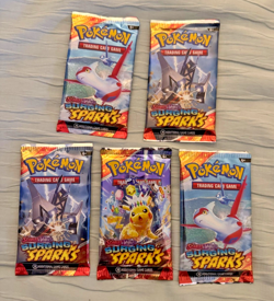 Lot Of 5 Pokemon Surging Sparks Booster Packs 10 Cards Per Pack SEALED - Image 1