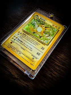 Pokemon TCG Raichu 14/102 Holo Rare Base Set Unlimited WOTC 1999 Vintage LP/NM - Image 1