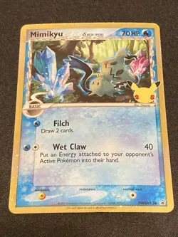 Pokemon - Mimikyu Delta Species - Celebrations Black Star Promo SWSH136 - Read - Image 1