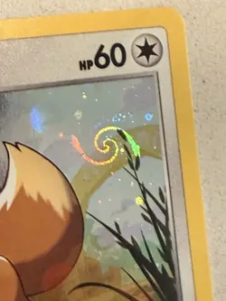 2021 Pokemon Eevee SWSH095 Black Star Promo Cosmos Holo Swirl NM - Image 2