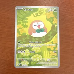 The Pokemon Company Rowlet 090/088 Prismatic Evolutions IR Holo Eng - Image 1