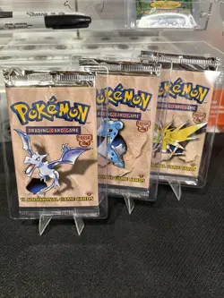 1999 Pokemon Fossil 1st Edition Booster Packs - Art Set (3 Factory Sealed packs) - Image 1