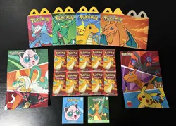 McDonald’s Pokemon 2025 Dragon Discovery 12 Packs Unopened 2 sealed + 4 Boxes - Image 1