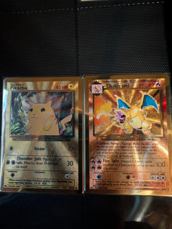 2021 CHARIZARD #4 & PKACHU #58 CELEBRATIONS ULTRA PREMIUM COLLECTION METAL CARDS - Image 1