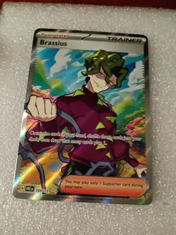Pokemon TCG Brassius Full Art Holo Card 135/131 Prismatic Evolutions Trainer - Image 1