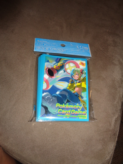 Pokemon Center Trading Card Game Canary & Mega Eelektross Deck Sleeve Set 0f 64 - Image 1