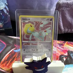 Uxie 18/123 Mysterious Treasures Holo - Image 1