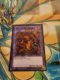 Yugioh! Meteor B. Dragon SBLS-EN013 Super Rare 1st LP - Image 1