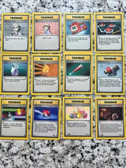 Pokemon Trainers 12-Card Lot Base Set, Jungle and Fossil 1st Editions Included - Image 1
