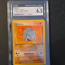 CGC 6.5 Rhyhorn 1st Edition Jungle 61/64 1999 English Regular Pokemon TCG - Image 1