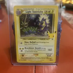 Pokemon TCG Light Toxtricity SWSH137 English Holo Card Celebrations Rare - Image 1