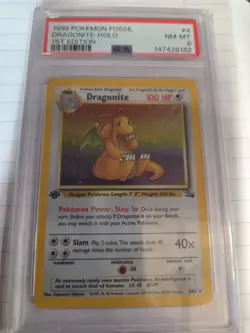 1999 POKEMON FOSSIL 1ST EDITION #4 DRAGONITE-HOLO PSA 8 - Image 1