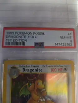 1999 POKEMON FOSSIL 1ST EDITION #4 DRAGONITE-HOLO PSA 8 - Image 2