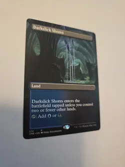 Darkslick Shores (Borderless) Phyrexia: All Will Be One Regular - Image 4