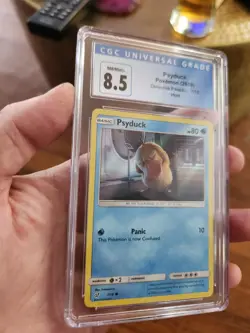 CGC 8.5 NM/MINT+ Psyduck Detective Pikachu Holo Pokemon Card 7/18 - Image 1