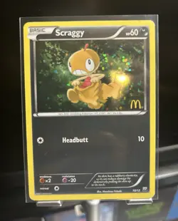 The Pokemon Company Scraggy 10/12 McDonald's 2012 Promo Holo EN 60 HP - Image 1