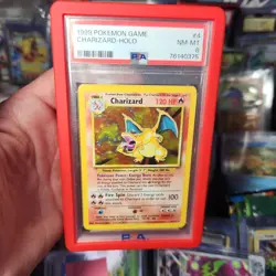 1999 POKEMON BASE SET UNLIMITED #4 CHARIZARD HOLO PSA 8 - Image 1