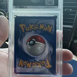 The Pokemon Company Charizard 004/130 Base Set 2 Holo Rare PSA 7 English - Image 2