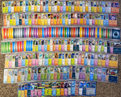 Pokemon 250 Pokemon TCG NM Trading Cards bulk lot (Includes 50 holos) - Image 1