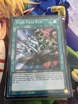 YUGIOH BLCR-EN068 Toon Page-Flip Secret Rare 1st Edition - Image 1