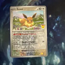 SV: Prismatic Evolutions #074/131 Eevee reverse Holo Pokemon Day TCG Card - Image 1