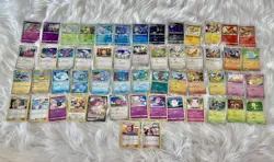 Bulk Lot of 54 Cute Pokemon Cards - Holo, Non-Holo, Ex, English, Chinese - Image 1