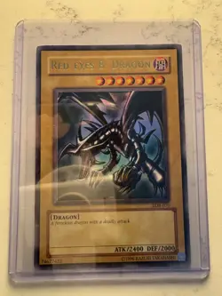 Red-Eyes B. Dragon Yu-Gi-Oh LOB-070 Unlimited Holographic Damaged - Image 1