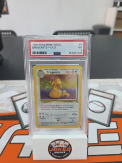 1999 Pokemon Fossil Dragonite - Holo 4/62 PSA 7 - Image 1