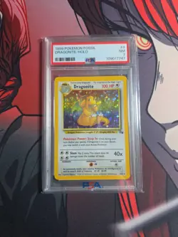 1999 Pokemon Fossil Dragonite Holo PSA 7 4/62 - Image 1