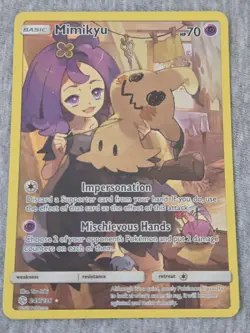 Pokemon TCG 245/236 Mimikyu Holographic Cosmic Eclipse Card - Image 1