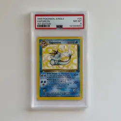 PSA 8 1999 POKEMON JUNGLE #28 VAPOREON 1ST EDITION - Image 1