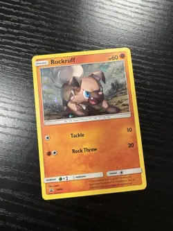 Rare Rockruff SM06 Black Star Promo Holo Pokemon TCG Card 2017 - Image 1