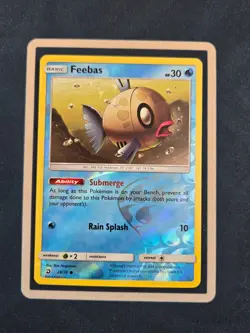 Pokemon TCG - Feebas - 28/70 Dragon Majesty - Reverse - Image 1