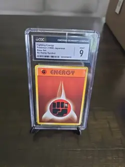 1996 POKEMON JAPANESE BASE SET NO RARITY SYMBOL FIGHTING ENERGY CGC 9 - Image 1