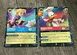 Disney Lorcana EPCOT Festival of the Arts Holographic Cards Rapunzel & Donald - Image 1
