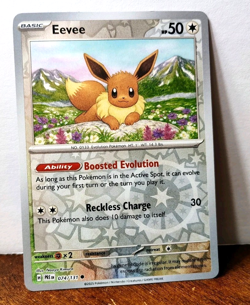 POKEMON EEVEE 074/131 REVERSE HOLO PRISMATIC EVOLUTIONS LP - Image 1