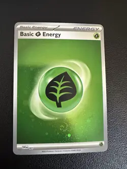 Pokemon Basic Grass Energy Cosmos Holo 001 Pokemon Card – Near Mint – SVE - Image 1
