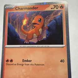 Charmander - 047 (Cosmos Holo) - Pokemon SV: Scarlet & Violet Black Star Promo - Image 2